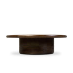 With soft, contemporary shaping, this coffee table crafted of spiced oak features stacked, channeled reeding on the base for a look of fluid movement.As lovers of clean aesthetics at Amethyst, we love the nature inspired Benny Coffee Table - Spiced Oak. This item pairs well with other brands such as Verellen and is perfect for wabi sabi homes Amethyst Home provides interior design, new home construction design consulting, vintage area rugs, and lighting in the Charlotte metro area.