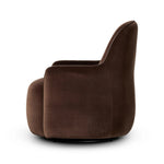 Compact and cozy, this high-back swivel chair with pillow-formed arms features contrast piping outlining its silhouette. Velvety performance fabric in a deep brown hue offers maximum comfort. The base is affixed to a 360-degree swivel for relaxed lounging. Amethyst Home provides interior design, new home construction design consulting, vintage area rugs, and lighting in the Park City metro area.