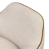 Featuring Bethany Alcala Wheat Swivel Chair by Four Hands at Amethyst Home. Laid-back wing styling adds dramatic form to this tailored 360-degree swivel chair upholstered in poly-linen performance fabric. The flared arms and comfortable S-spring seat are outlined in piping. Performance fabrics are specially created to withstand spills, stains, high traffic and. Amethyst Home provides interior design, new home construction design consulting, vintage area rugs, and lighting in the Dallas metro area.