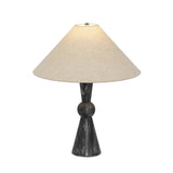 Polished forms define this sculptural table lamp, featuring a base of black Italian marble with distinctive white veining and a tapered flax linen shade.Collection: Ashe Amethyst Home provides interior design, new home construction design consulting, vintage area rugs, and lighting in the Houston metro area.