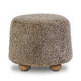 For an extra seat or propped feet, this welcoming ottoman features a subtly tapered shape and a rounded base with bun feet beneath. Crafted from solid oak and upholstered with taupe shearling for extra texture Amethyst Home provides interior design, new home construction design consulting, vintage area rugs, and lighting in the Omaha metro area.