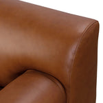 A low-slung and layered design inspired by mid-century Italian seating. The sofa balances a slim metal frame with a voluminous feather-blended interior wrapped in top-grain leather that only gets better with age.As enthusiasts of luxe style at Amethyst, we love the nature inspired Blaine Sofa -96" - Lorento Cognac. Amethyst Home provides interior design, new home construction design consulting, vintage area rugs, and lighting in the Scottsdale metro area.