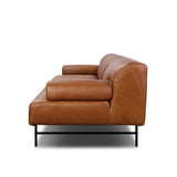 A low-slung and layered design inspired by mid-century Italian seating. The sofa balances a slim metal frame with a voluminous feather-blended interior wrapped in top-grain leather that only gets better with age.As enthusiasts of luxe style at Amethyst, we love the nature inspired Blaine Sofa -96" - Lorento Cognac. Amethyst Home provides interior design, new home construction design consulting, vintage area rugs, and lighting in the Washington metro area.