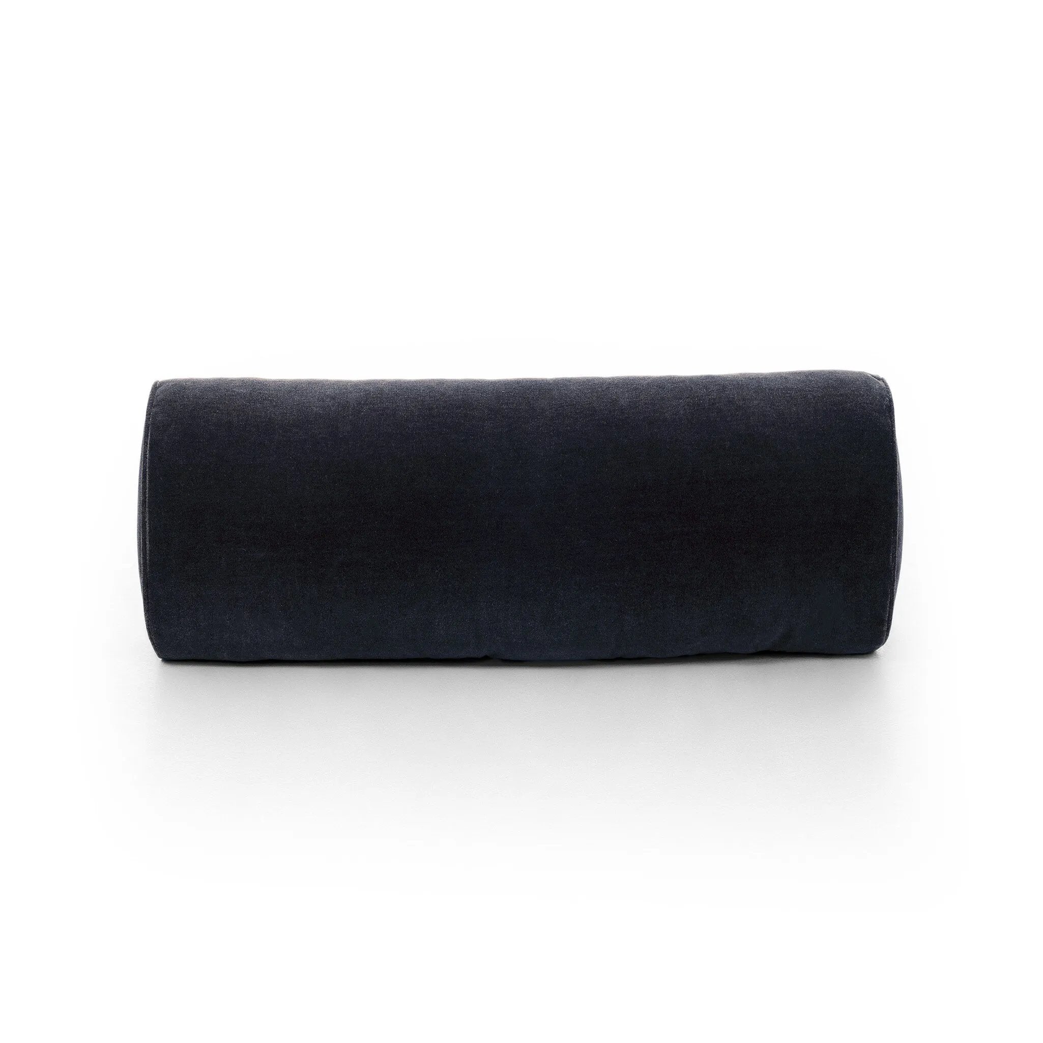 A long, navy-colored bolster pillow elevates beds and sofas in an instant. Crafted from saturated wool velvet, for a sustainable alternative to mohair, with a hidden zipper for a smooth silhouette.As lovers of wabi sabi aesthetics at Amethyst, we love the warm modern inspired Bridger Bolster Pillow - Monte Navy. Amethyst Home provides interior design, new home construction design consulting, vintage area rugs, and lighting in the Austin metro area.