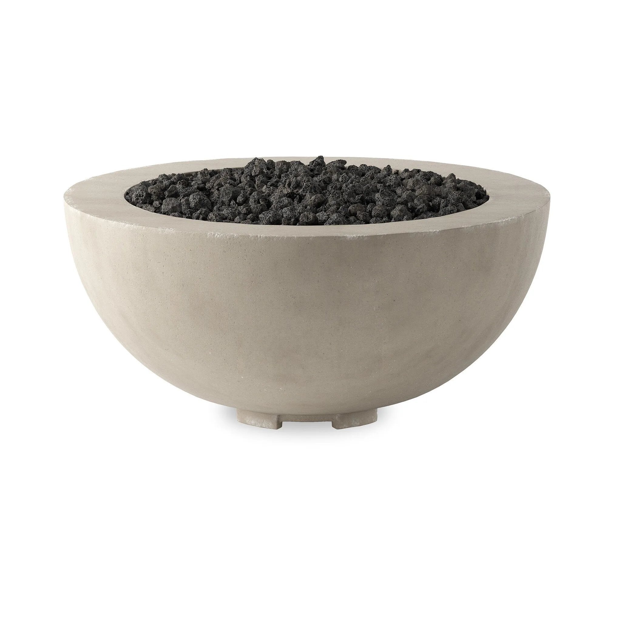 This outdoor fire table is a welcoming centerpiece designed for gathering. Made from glass-reinforced concrete, each piece is naturally finished with subtle tones of grey and cream. The bowl shape is completed with lavastones in the center, bringing together a bold, monochromatic look. Amethyst Home provides interior design, new home construction design consulting, vintage area rugs, and lighting in the Nashville metro area.