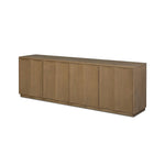 The traditional media console, reimagined. This warm oak piece features two sets of doors with shallow scalloping that draws the eye, providing a subtle visual flow. Rear cutouts for cord management.As lovers of natural aesthetics at Amethyst, we love the designer inspired Brookhurst Media Console - Drifted Oak Veneer. Amethyst Home provides interior design, new home construction design consulting, vintage area rugs, and lighting in the Washington metro area.