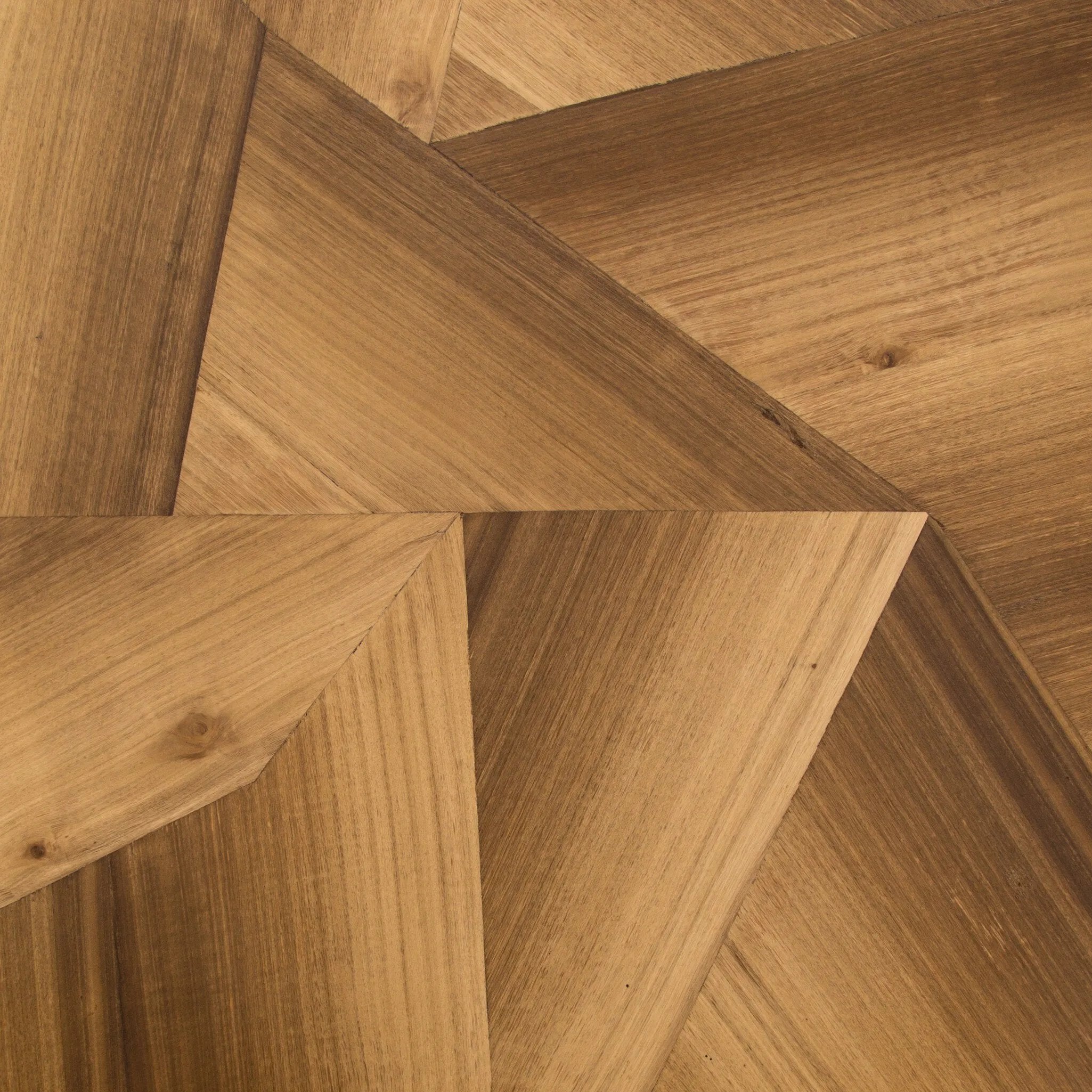 A shape-centric statement piece. Blonde yukas woods are blended and smoothed for a soft look rich with innate depth. Asymmetric sides form a casual octagon, bringing reimagined geometry to the table. Each style slightly unique, thanks to materials' natural quality. Amethyst Home provides interior design, new home construction design consulting, vintage area rugs, and lighting in the San Diego metro area.