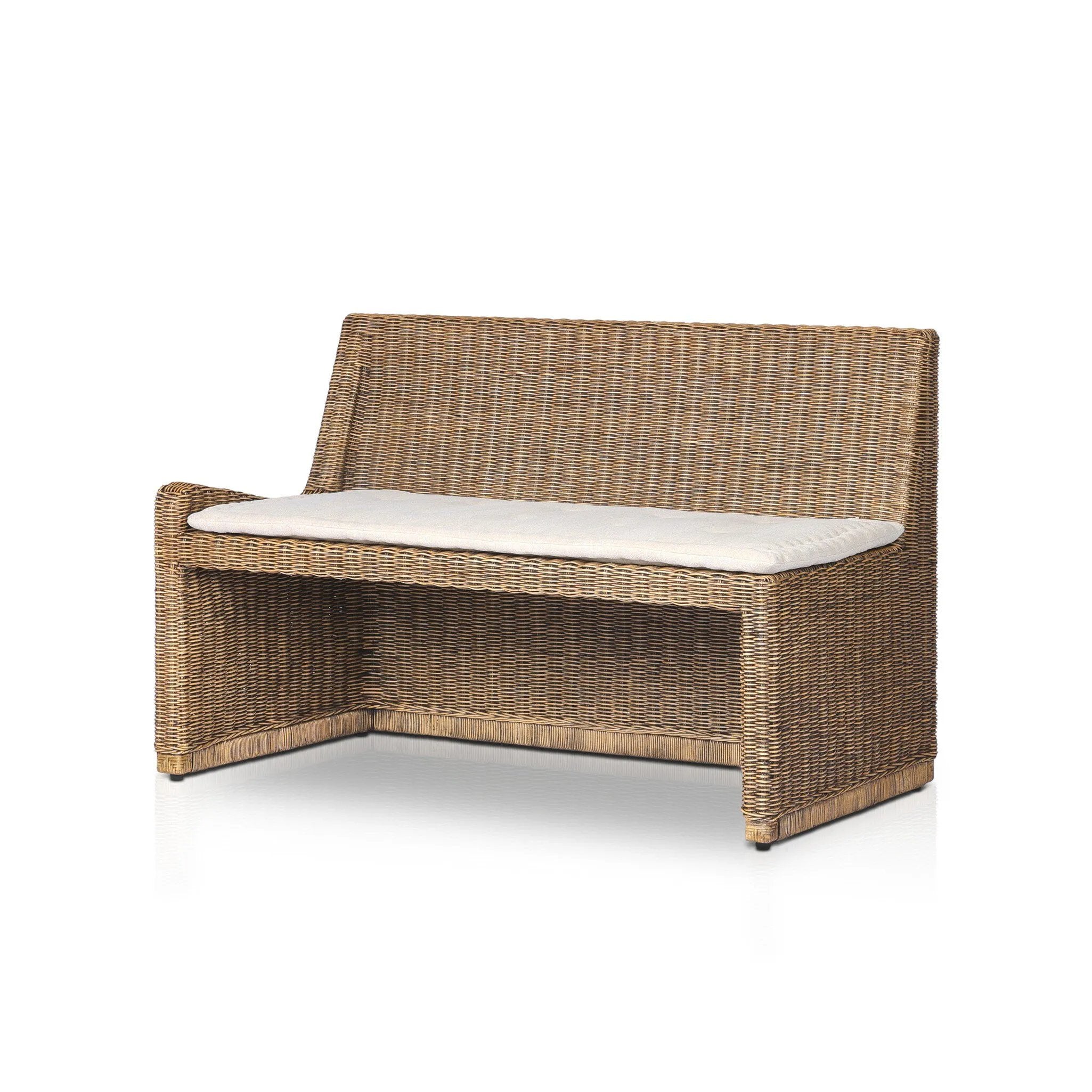 Antique-inspired coastal style. Rattan introduces varying natural shades and texture to this dining bench, and the frame's soft lines and fabric cushion invite a comfortable sit. Option to style alone or pair with other pieces in the collection. A design collaboration by Amber Lewis and Four Hands. Winner of the Domino Good Design Awards 2024. Amethyst Home provides interior design, new home construction design consulting, vintage area rugs, and lighting in the Winter Garden metro area.