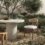 Featuring Buxton Arashi Salt Outdoor Dining Chair by Four Hands at Amethyst Home. The traditional whistler chair, reimagined for the great outdoors. Crafted from FSC®-certified teak, tapered legs extend to a woven back of faux hyacinth, complete with a soft, durable seat cushion. Cover or store indoors during inclement weather and when not in use. Overall D. Amethyst Home provides interior design, new home construction design consulting, vintage area rugs, and lighting in the Calabasas metro area.