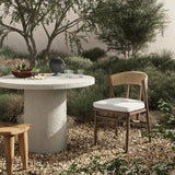 Featuring Buxton Arashi Salt Outdoor Dining Chair by Four Hands at Amethyst Home. The traditional whistler chair, reimagined for the great outdoors. Crafted from FSC®-certified teak, tapered legs extend to a woven back of faux hyacinth, complete with a soft, durable seat cushion. Cover or store indoors during inclement weather and when not in use. Overall D. Amethyst Home provides interior design, new home construction design consulting, vintage area rugs, and lighting in the Calabasas metro area.