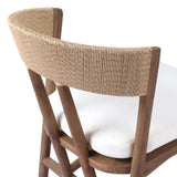 Featuring Buxton Arashi Salt Outdoor Dining Chair by Four Hands at Amethyst Home. The traditional whistler chair, reimagined for the great outdoors. Crafted from FSC®-certified teak, tapered legs extend to a woven back of faux hyacinth, complete with a soft, durable seat cushion. Cover or store indoors during inclement weather and when not in use. Overall Dim. Amethyst Home provides interior design, new home construction design consulting, vintage area rugs, and lighting in the Houston metro area.