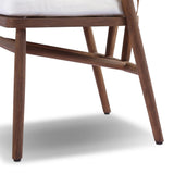 Featuring Buxton Arashi Salt Outdoor Dining Chair by Four Hands at Amethyst Home. The traditional whistler chair, reimagined for the great outdoors. Crafted from FSC®-certified teak, tapered legs extend to a woven back of faux hyacinth, complete with a soft, durable seat cushion. Cover or store indoors during inclement weather and when not in use. Overall Di. Amethyst Home provides interior design, new home construction design consulting, vintage area rugs, and lighting in the Monterey metro area.