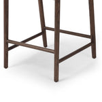 Featuring Buxton Natural Paper Rush Bar + Counter Stool by Four Hands at Amethyst Home. A solid oak counter stool defined by tapered legs and framing gives an updated look to the classic whistler chair. Finished with a paper rush wrapped detail on the back.BarOverall Dimensions: 19.25"w x 22.25"d x 42.75"hWeight: 23.70 lbsCounterOverall Dimensions: 19.50"w . Amethyst Home provides interior design, new home construction design consulting, vintage area rugs, and lighting in the Charlotte metro area.