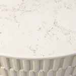 Cast concrete shapes a drum-style outdoor coffee table, with a linear pattern layered for added texture. Finished with a parchment-like textural feel. Cover or store inside during inclement weather and when not in use.As lovers of wabi sabi design at Amethyst, we love the warm modern inspired Callisto Outdoor Coffee Table - Aged White Concrete. Amethyst Home provides interior design, new home construction design consulting, vintage area rugs, and lighting in the Alpharetta metro area.