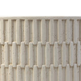 Cast concrete shapes a drum-style outdoor coffee table, with a linear pattern layered for added texture. Finished with a parchment-like textural feel. Cover or store inside during inclement weather and when not in use.As lovers of wabi sabi design at Amethyst, we love the warm modern inspired Callisto Outdoor Coffee Table - Aged White Concrete. Amethyst Home provides interior design, new home construction design consulting, vintage area rugs, and lighting in the Omaha metro area.
