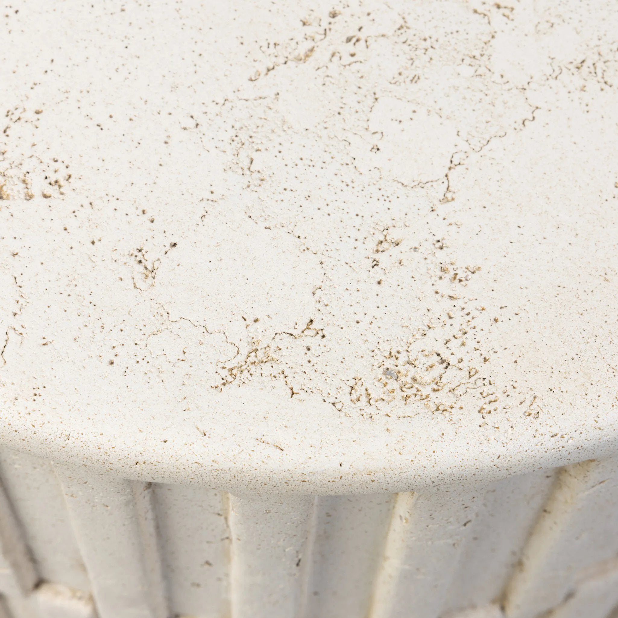 Cast concrete shapes a drum-style outdoor end table, with a linear pattern layered for added texture. Finished with a parchment-like textural feel. Cover or store inside during inclement weather and when not in use.As enthusiasts of luxe style at Amethyst, we love the optimistic inspired Callisto Outdoor End Table - Aged White Concrete. Amethyst Home provides interior design, new home construction design consulting, vintage area rugs, and lighting in the Alpharetta metro area.