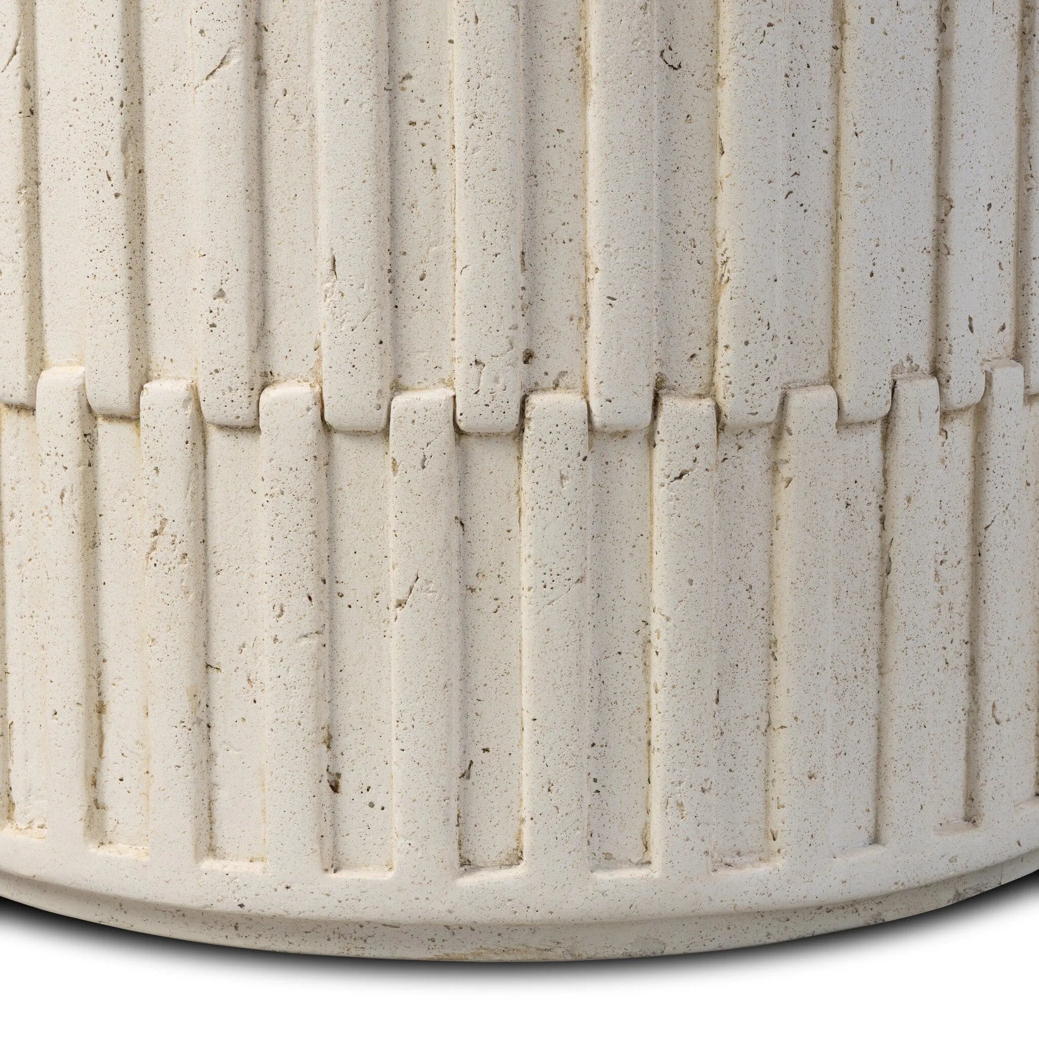 Cast concrete shapes a drum-style outdoor end table, with a linear pattern layered for added texture. Finished with a parchment-like textural feel. Cover or store inside during inclement weather and when not in use.As enthusiasts of luxe style at Amethyst, we love the optimistic inspired Callisto Outdoor End Table - Aged White Concrete. Amethyst Home provides interior design, new home construction design consulting, vintage area rugs, and lighting in the Washington metro area.
