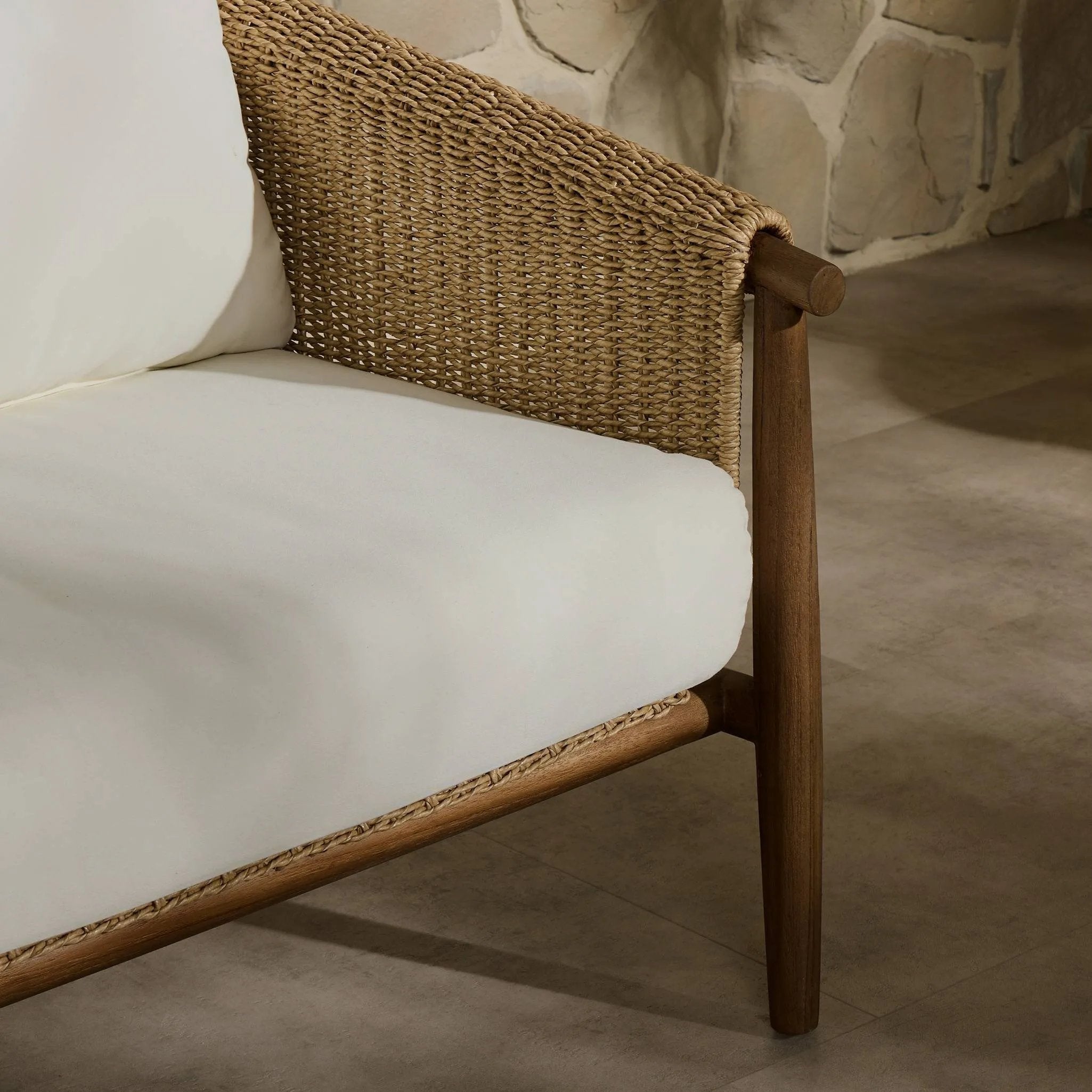 Featuring Cambrie Arashi Salt Outdoor Sofa 76" by Four Hands at Amethyst Home. Bring home vintage inspiration. The sling shape of this outdoor sofa features a reimagined bucket seat in woven faux hyacinth, finished with rounded tapered legs that mirror the shape of the frame. Cover or store indoors during inclement weather and when not in use. Overall Dime. Amethyst Home provides interior design, new home construction design consulting, vintage area rugs, and lighting in the Des Moines metro area.