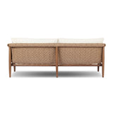 Featuring Cambrie Arashi Salt Outdoor Sofa 76" by Four Hands at Amethyst Home. Bring home vintage inspiration. The sling shape of this outdoor sofa features a reimagined bucket seat in woven faux hyacinth, finished with rounded tapered legs that mirror the shape of the frame. Cover or store indoors during inclement weather and when not in use. Overall D. Amethyst Home provides interior design, new home construction design consulting, vintage area rugs, and lighting in the Newport Beach metro area.