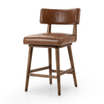 Featuring Cardell Sonoma Chestnut Swivel Bar + Counter Stool by Four Hands at Amethyst Home. This reimagined classic pairs a barrel back frame of solid nettlewood with top-grain leather in a rich chestnut. A 180-degree swivel with return memory tops off the piece with fresh functionality.BarOverall Dimensions: 21.50"w x 22.25"d x 42.50"hWeight: 24.25 lbs. Amethyst Home provides interior design, new home construction design consulting, vintage area rugs, and lighting in the Laguna Beach metro area.