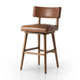 Featuring Cardell Sonoma Chestnut Swivel Bar + Counter Stool by Four Hands at Amethyst Home. This reimagined classic pairs a barrel back frame of solid nettlewood with top-grain leather in a rich chestnut. A 180-degree swivel with return memory tops off the piece with fresh functionality.BarOverall Dimensions: 21.50"w x 22.25"d x 42.50"hWeight: 24.25 lbsCo. Amethyst Home provides interior design, new home construction design consulting, vintage area rugs, and lighting in the Washington metro area.