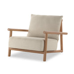 Featuring Cardiff Faye Sand Outdoor Chair by Four Hands at Amethyst Home. Angular FSC®-certified teak framing paired with softened dowel edges crafts a bench-made, transitional outdoor chair. Strap detailing supports the loose, knife-edge back cushion, complemented by a heavy fixed seat cushion — adding a touch of weight to the airy design. Cover or store indo. Amethyst Home provides interior design, new home construction design consulting, vintage area rugs, and lighting in the Austin metro area.