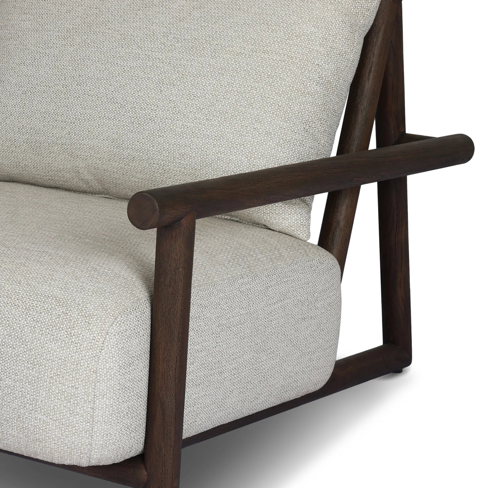 Featuring Cardiff Faye Sand Outdoor Chair by Four Hands at Amethyst Home. Angular FSC®-certified teak framing paired with softened dowel edges crafts a bench-made, transitional outdoor chair. Strap detailing supports the loose, knife-edge back cushion, complemented by a heavy fixed seat cushion — adding a touch of weight to the airy design. Cover or store ind. Amethyst Home provides interior design, new home construction design consulting, vintage area rugs, and lighting in the Seattle metro area.