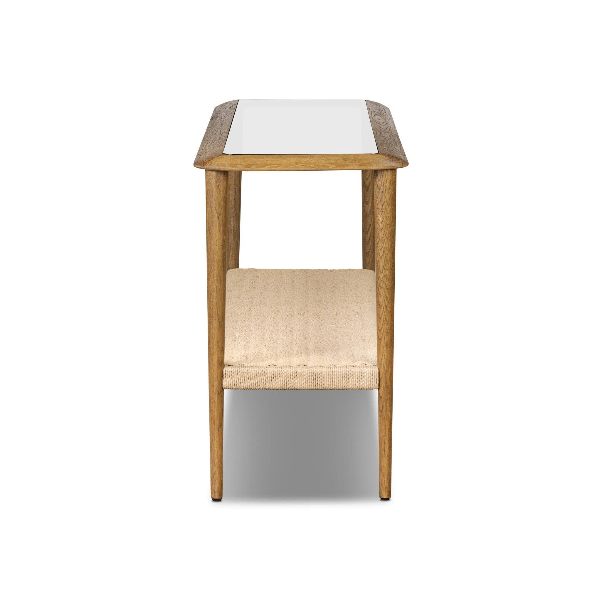 Made from brown oak, woven paper cord and tempered glass, an open-style console works into any space or style with ease, thanks to its beautifully versatile design Amethyst Home provides interior design, new home construction design consulting, vintage area rugs, and lighting in the Calabasas metro area.