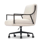 Sink-in comfort, modern appeal and no fuss. This Deco-inspired desk chair's sloped hammered iron arms and ebony metal swivel base stand out against snow white upholstery. Crypton® performance fabric is specially engineered for protection against stains, moisture and odor. Amethyst Home provides interior design, new home construction design consulting, vintage area rugs, and lighting in the Charlotte metro area.