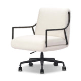 Sink-in comfort, modern appeal and no fuss. This Deco-inspired desk chair's sloped hammered iron arms and ebony metal swivel base stand out against snow white upholstery. Crypton® performance fabric is specially engineered for protection against stains, moisture and odor. Amethyst Home provides interior design, new home construction design consulting, vintage area rugs, and lighting in the Laguna Beach metro area.