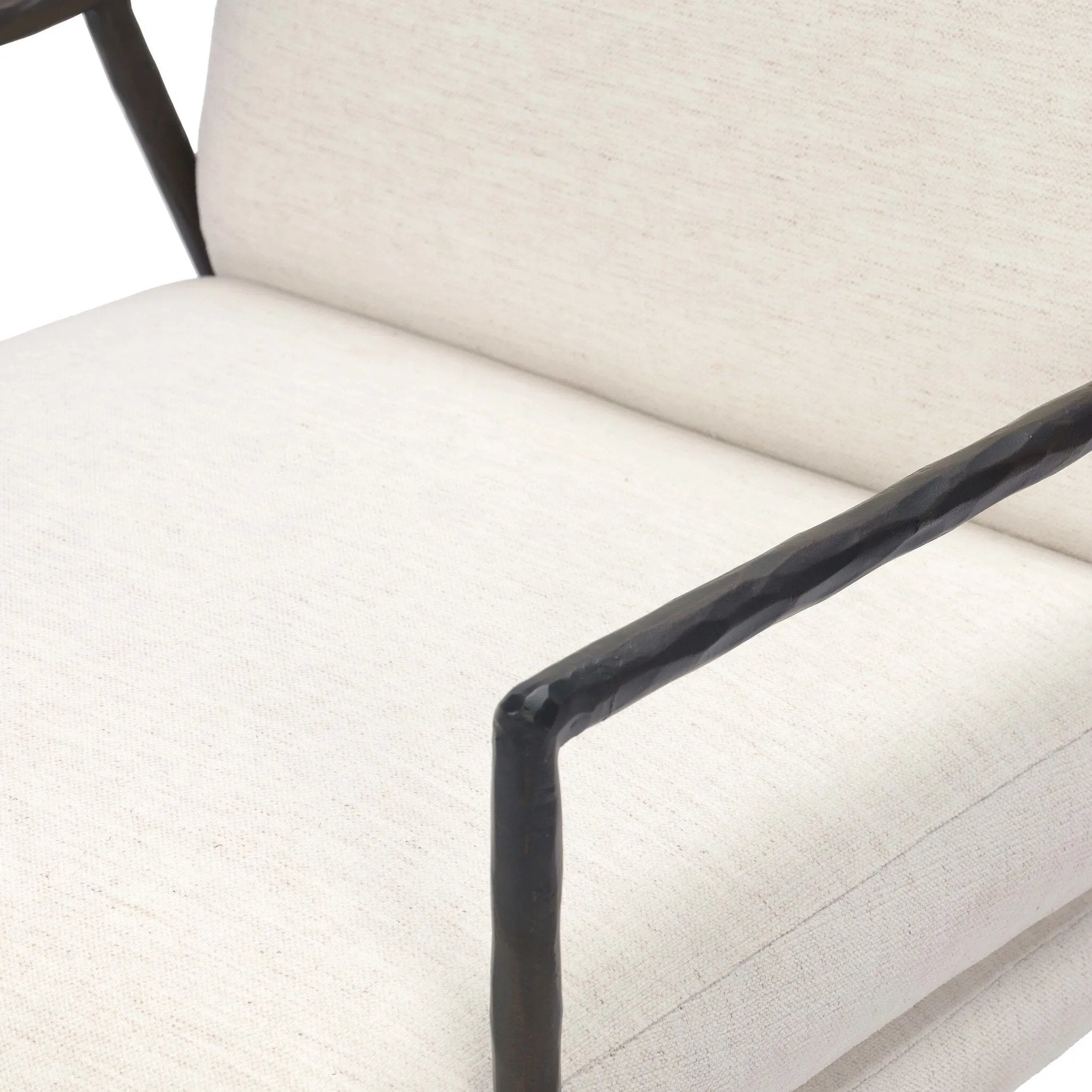 Sink-in comfort, modern appeal and no fuss. This Deco-inspired desk chair's sloped hammered iron arms and ebony metal swivel base stand out against snow white upholstery. Crypton® performance fabric is specially engineered for protection against stains, moisture and odor. Amethyst Home provides interior design, new home construction design consulting, vintage area rugs, and lighting in the Salt Lake City metro area.