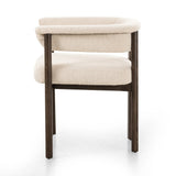 Featuring Cassie Charter Oatmeal Dining Chair by Four Hands at Amethyst Home. Upholstered in high-performance fabric, this sculpted dining style features a comfortable yoke back and exterior fold detailing, all framed by solid ash. Performance fabrics are specially created to withstand spills, stains, high traffic and wear, ensuring long-term comfort and un. Amethyst Home provides interior design, new home construction design consulting, vintage area rugs, and lighting in the Calabasas metro area.