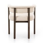 Featuring Cassie Charter Oatmeal Dining Chair by Four Hands at Amethyst Home. Upholstered in high-performance fabric, this sculpted dining style features a comfortable yoke back and exterior fold detailing, all framed by solid ash. Performance fabrics are specially created to withstand spills, stains, high traffic and wear, ensuring long-term comfort and u. Amethyst Home provides interior design, new home construction design consulting, vintage area rugs, and lighting in the Washington metro area.