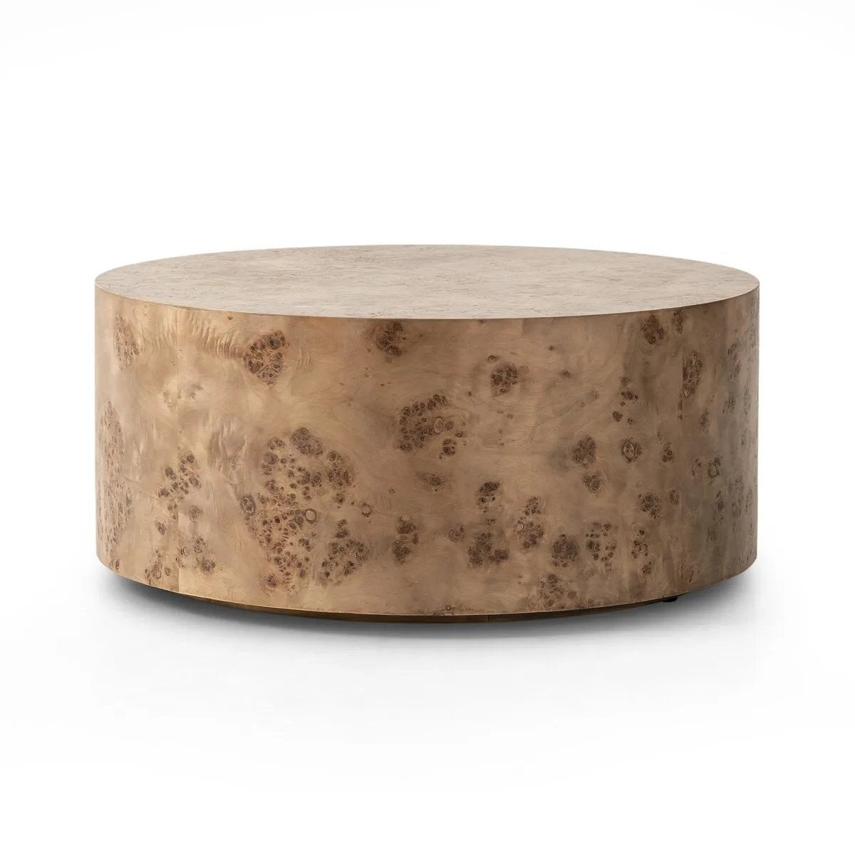Featuring Caya Caramel Burl Coffee Table by Four Hands at Amethyst Home. Simple drum shaping showcases the natural artistry of the richly grained caramel burl veneer. Its compact size is ideal for smaller spaces.
Overall Dimensions: 31.5" L x 31.5 " W x 13.75" H
Collection: HughesColors: Caramel BurlMaterials: Light Maple Veneer, Poplar PlywoodWeight: 44.09 l. Amethyst Home provides interior design, new home construction design consulting, vintage area rugs, and lighting in the Houston metro area.