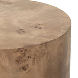 A simple drum shape showcases the natural artistry of the richly grained caramel burl veneer. Its compact size is ideal for smaller spaces.Collection: Hughe Amethyst Home provides interior design, new home construction design consulting, vintage area rugs, and lighting in the Kansas City metro area.