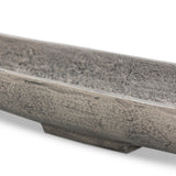 Statement-making centerpiece bowl featuring dramatic swooping lines, taking inspiration from Japanese fishing canoes. Cast in solid aluminum and supported by a single pedestal foot, giving the illusion that it's truly floating off the table.As lovers of clean design at Amethyst, we love the designer inspired Cerys Bowl - Raw Antique Nickel. Amethyst Home provides interior design, new home construction design consulting, vintage area rugs, and lighting in the Salt Lake City metro area.