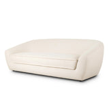 Inspired by French modernism, this dramatic sofa is defined by exaggerated curves, tapered arms and oversized welt detailing along the bench cushion for a tailored look. Soft, easy to clean and free of PFAS, Crypton® performance fabric is specially engineered for protection against stains, moisture and odor. Amethyst Home provides interior design, new home construction design consulting, vintage area rugs, and lighting in the Alpharetta metro area.