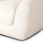 Inspired by French modernism with a nod to Jean Royere's design classic, the Polaire. Our take is defined by exaggerated curves, tapered arms and oversized welt detailing along the reversible seat cushion for a tailored look, finished with a 360-degree swivel. Amethyst Home provides interior design, new home construction design consulting, vintage area rugs, and lighting in the Austin metro area.