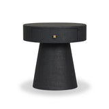 Wrapped in black painted linen, a rounded nightstand features a single drawer and tapered pedestal base, bringing texture plus storage to the bedside Amethyst Home provides interior design, new home construction design consulting, vintage area rugs, and lighting in the Omaha metro area.