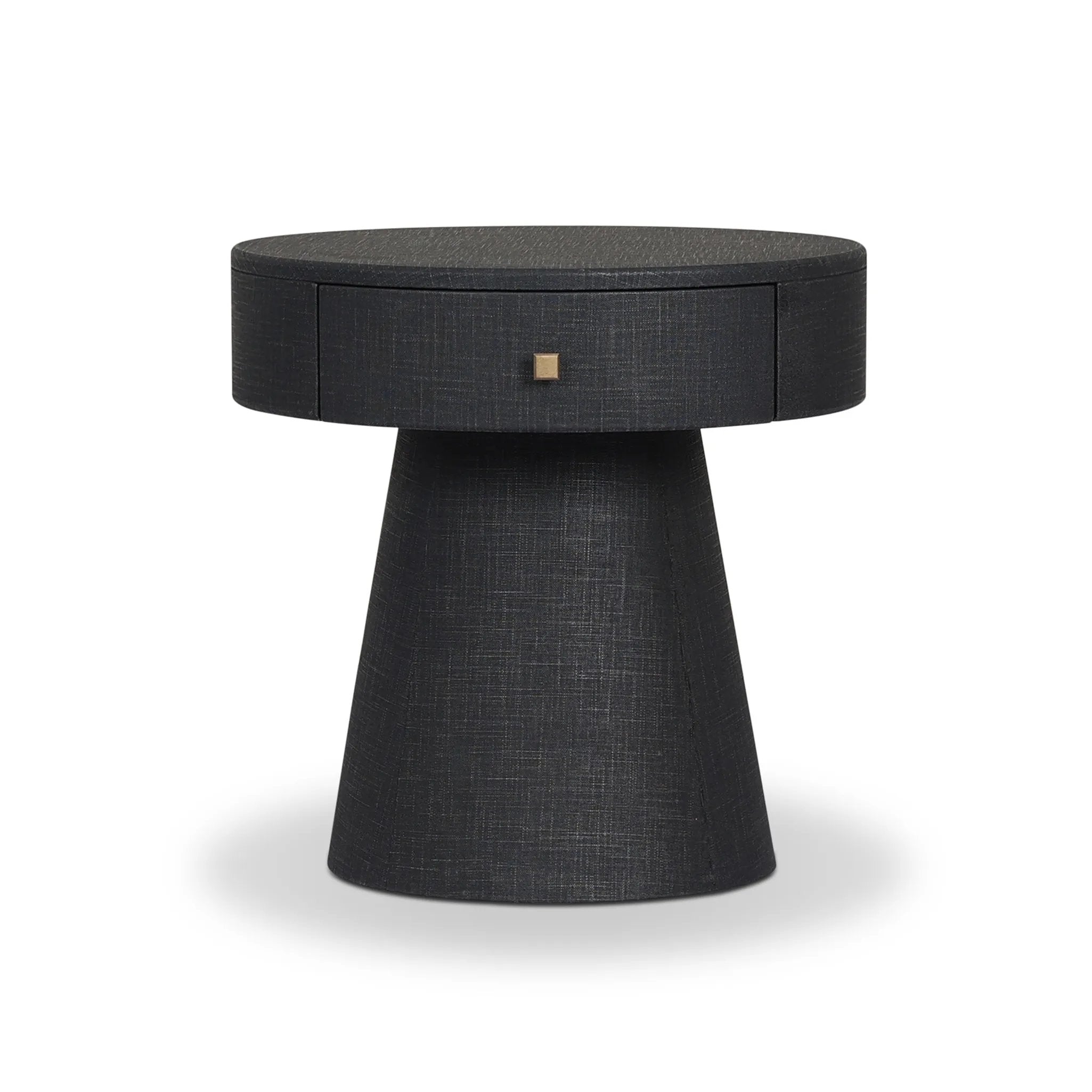 Wrapped in black painted linen, a rounded nightstand features a single drawer and tapered pedestal base, bringing texture plus storage to the bedside Amethyst Home provides interior design, new home construction design consulting, vintage area rugs, and lighting in the Omaha metro area.