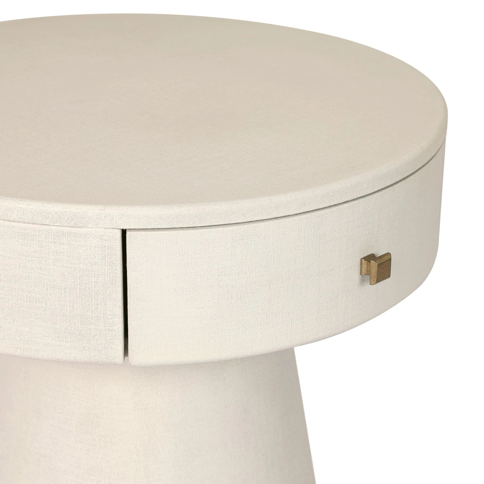 Wrapped in ivory painted linen, a rounded nightstand features a single drawer and tapered pedestal base, bringing crisp texture plus storage to the bedside Amethyst Home provides interior design, new home construction design consulting, vintage area rugs, and lighting in the Dallas metro area.