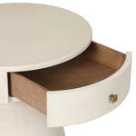 Wrapped in ivory painted linen, a rounded nightstand features a single drawer and tapered pedestal base, bringing crisp texture plus storage to the bedside Amethyst Home provides interior design, new home construction design consulting, vintage area rugs, and lighting in the Winter Garden metro area.