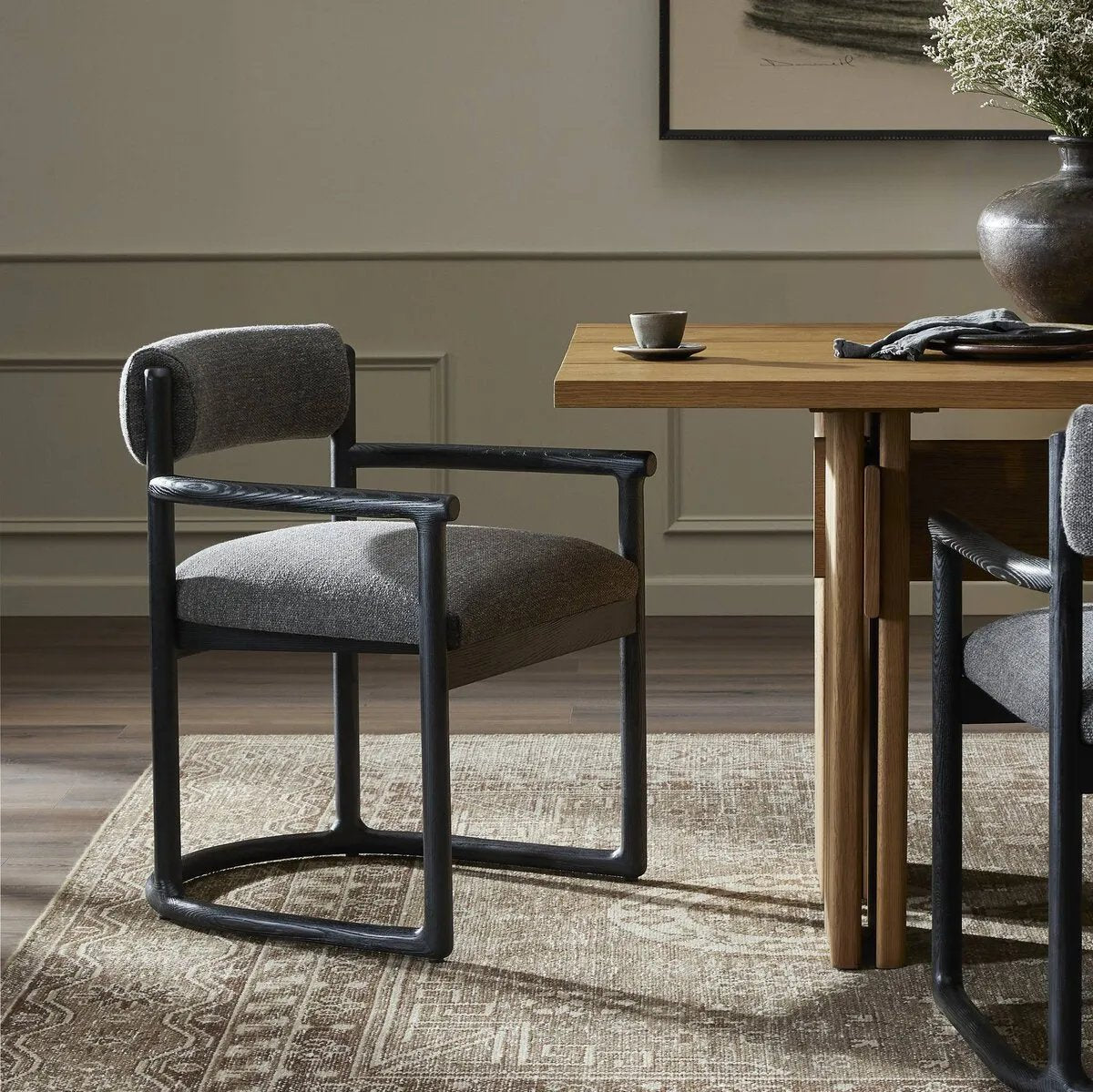 This Clarice Thames Ash Dining Chair is a versatile and stylish addition to your dining space. Its high-quality construction and sleek design provide comfort and elegance Amethyst Home provides interior design, new home construction design consulting, vintage area rugs, and lighting in the Charlotte metro area.