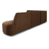Dramatically shaped and tightly tailored, this rounded dining banquette features soft angles all around. Upholstered in a ver