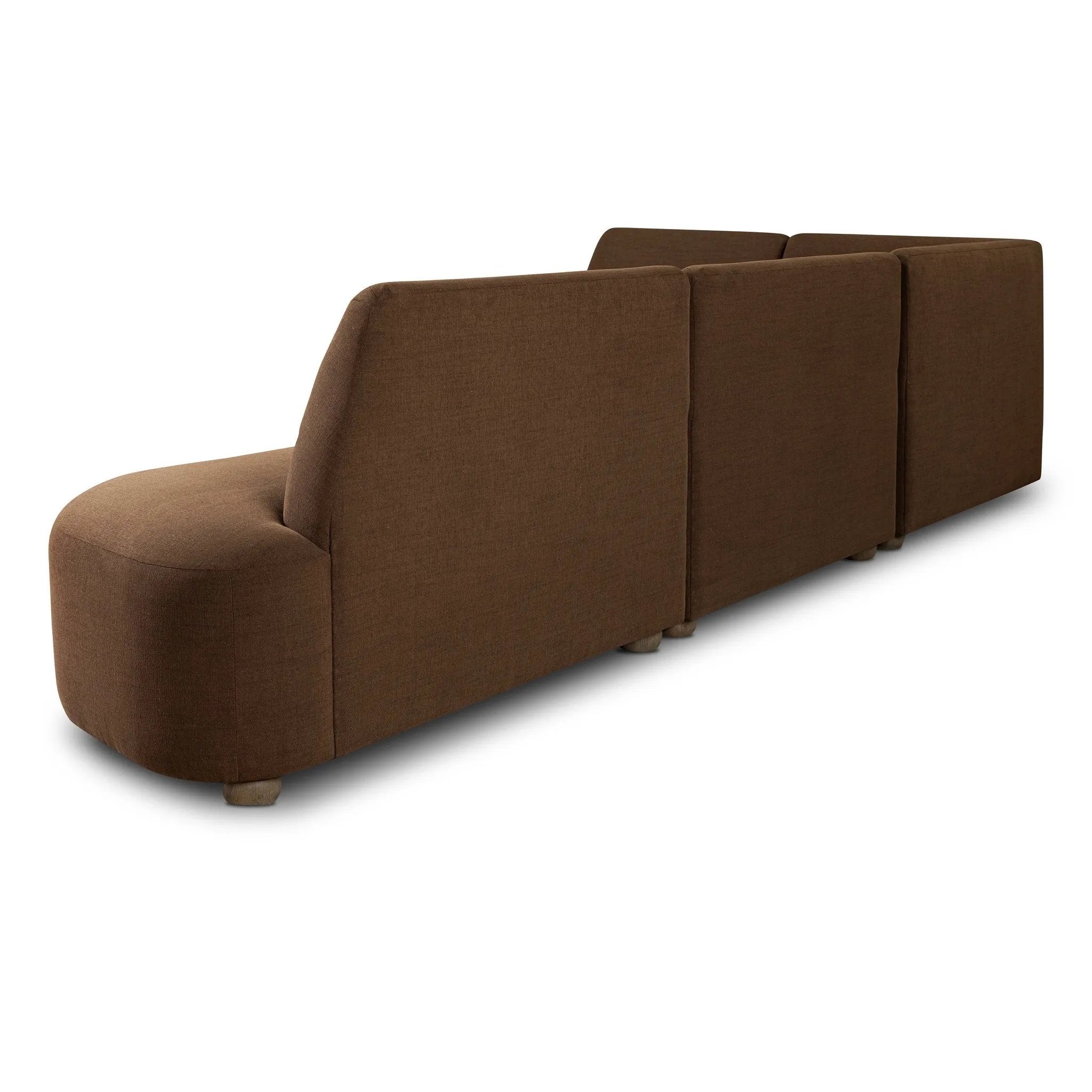 Dramatically shaped and tightly tailored, this rounded dining banquette features soft angles all around. Upholstered in a ver
