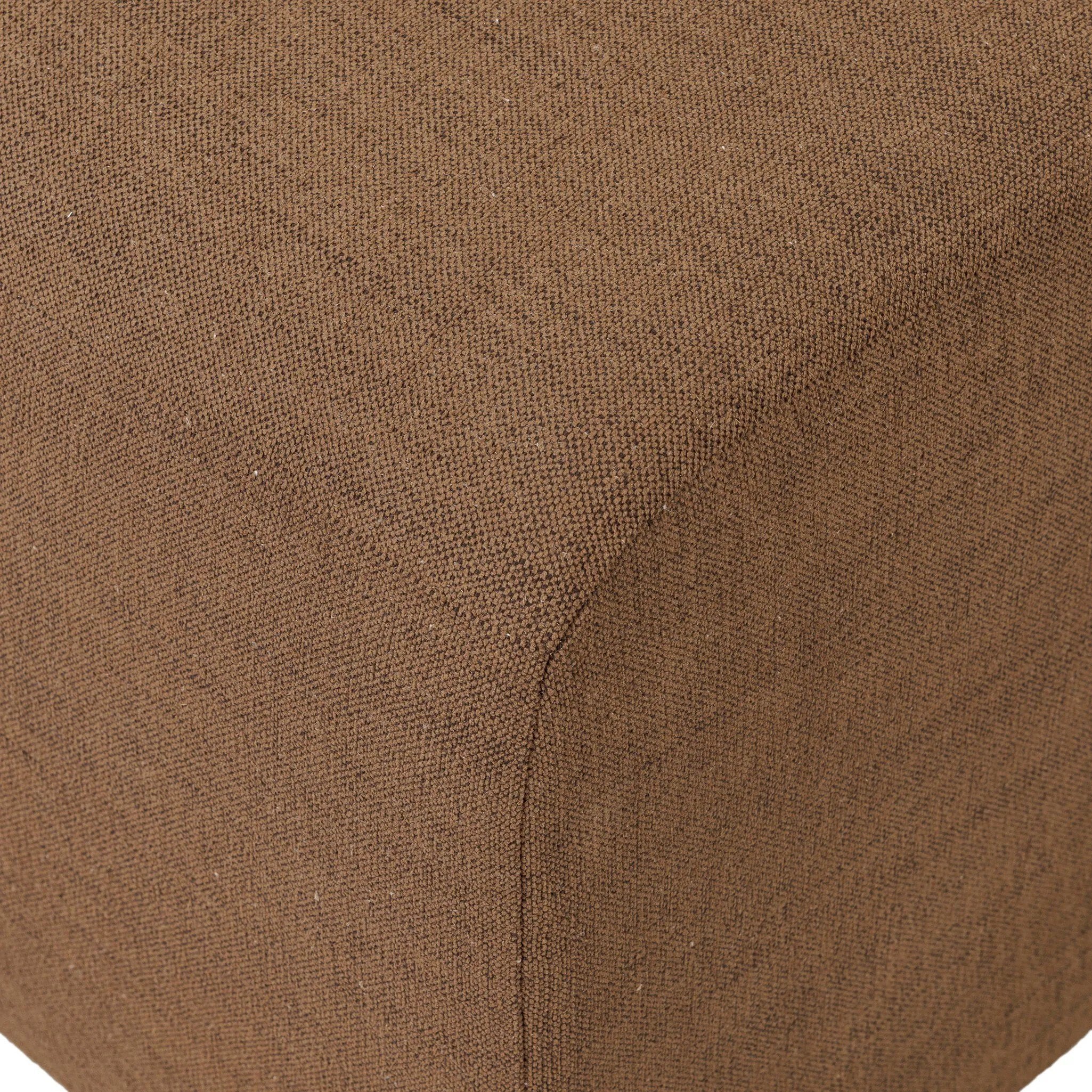Dramatically shaped and tightly tailored, this rounded dining banquette features soft angles all around. Upholstered in a ver