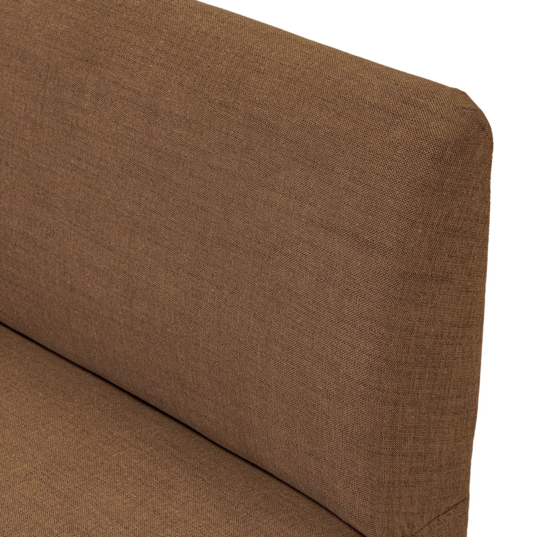 Dramatically shaped and tightly tailored, this rounded dining banquette features soft angles all around. Upholstered in a ver
