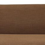Dramatically shaped and tightly tailored, this rounded dining banquette features soft angles all around. Upholstered in a ver