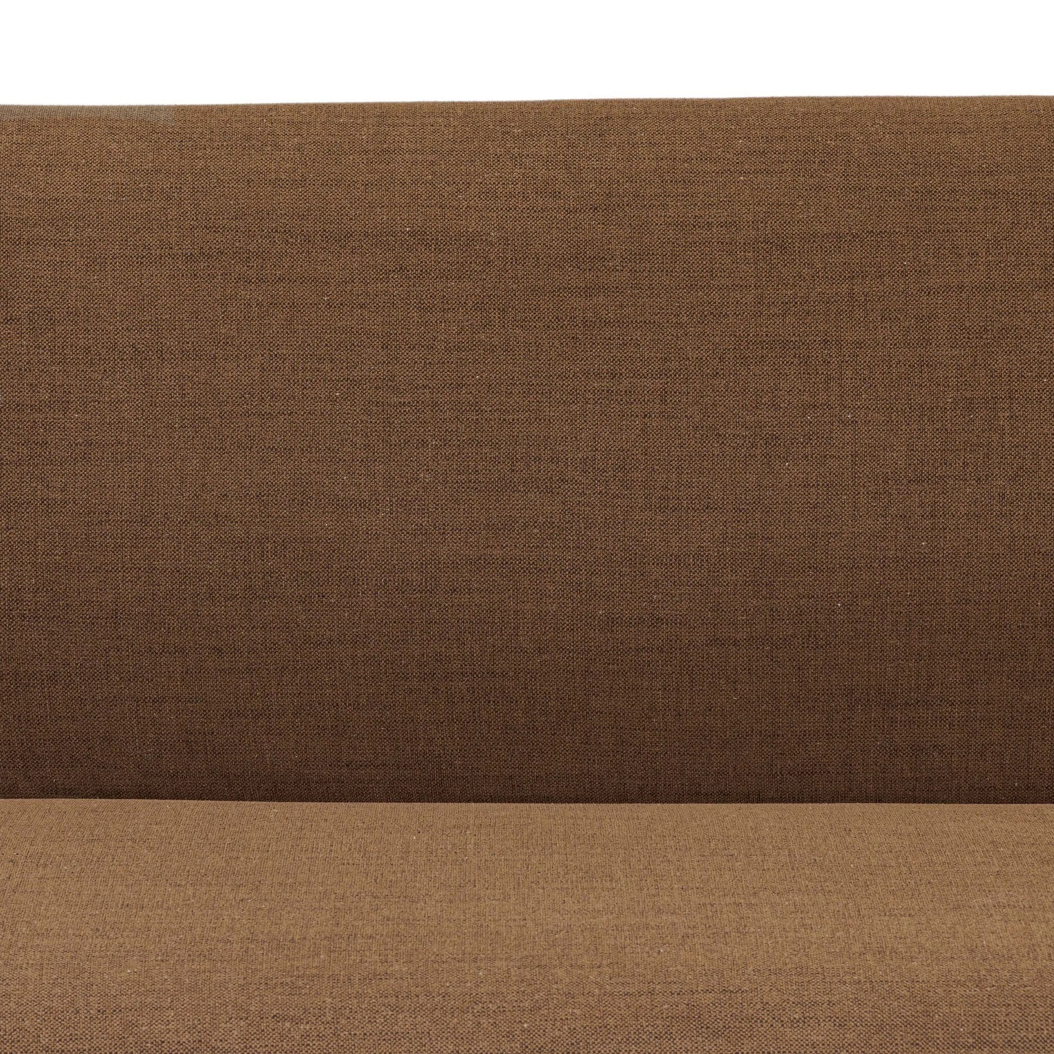 Dramatically shaped and tightly tailored, this rounded dining banquette features soft angles all around. Upholstered in a ver