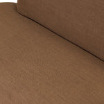 Dramatically shaped and tightly tailored, this rounded dining banquette features soft angles all around. Upholstered in a ver